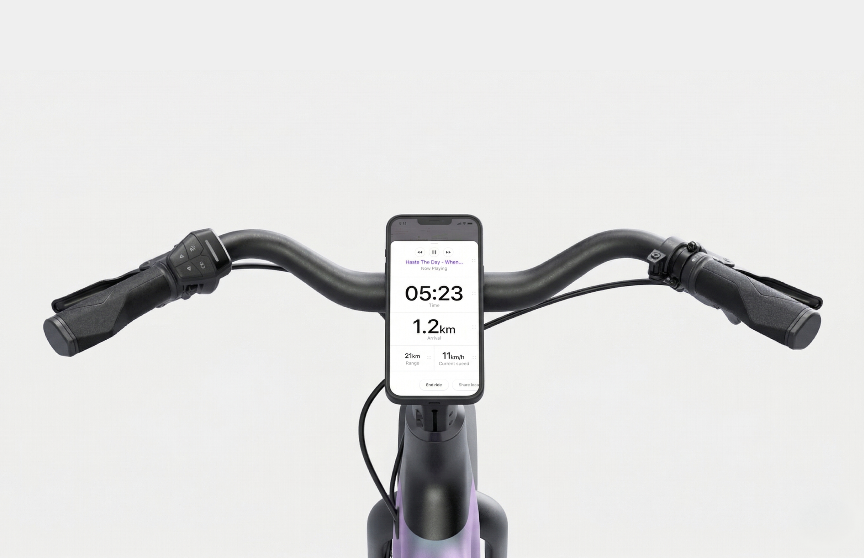 Front-on view of Dance e-bike handlebars with a phone showing a live ride stats